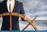 businessman-holding-ship-wheel-navigates-storm-businessman-holding-ship-rudder-navigates-storm-161380017.jpg